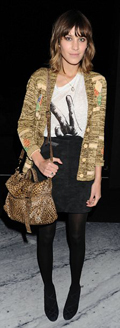 Alexa Chung, the UK "It" girl, with her Mulberry "It" handbag. Photo from Daily Mail.